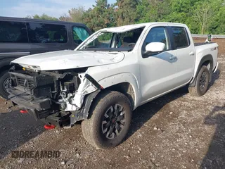 2024 Nissan Frontier SL with VIN 1N6ED1EK2RN656501, listed as a IAAI auction lot 42265453 with 3,813 mi miles and . Bid and sale history available at DreamBid. Image 2.