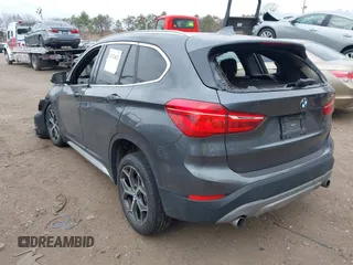 2017 BMW X1 sDrive28i with VIN WBXHU7C39H5H36722, listed as a IAAI auction lot 41724022 with 33,412 mi miles. Bid and sale history available at carsss.com. Image 3.
