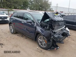 2025 Cadillac XT4 FWD Premium Luxury z VIN 1GYFZCR40SF148814, wystawiony jako IAAI lot #41598124 z przebiegiem Nie podano mil oraz . Historia ofert i sprzedaży dostępna na DreamBid. Obrazek 1.