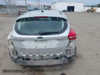 2015 Ford Focus Titanium with VIN 1FADP3N27FL228549, listed as a IAAI auction lot 41912941 with 69,025 mi miles. Bid and sale history available at carsss.com. Image 16.