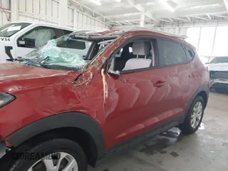 2021 Hyundai Tucson Value with VIN KM8J33A44MU363524, listed as a IAAI auction lot 41854508 with 59,821 mi miles. Bid and sale history available at carsss.com. Image 14.