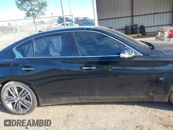 2015 Infiniti Q50 Premium z VIN JN1BV7AR5FM418350, wystawiony jako IAAI lot #41622894 z przebiegiem 135 478 mil mil oraz . Historia ofert i sprzedaży dostępna na DreamBid. Obrazek 14.