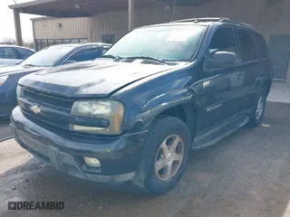 2004 Chevrolet TrailBlazer LT with VIN 1GNDT13S742129740, listed as a IAAI auction lot 41855217 with 205,496 mi miles. Bid and sale history available at carsss.com. Image 2.