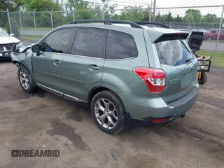 2015 Subaru Forester Touring with VIN JF2SJAWC9FH561581, listed as a IAAI auction lot 42237512 with 109,210 mi miles and . Bid and sale history available at DreamBid. Image 3.