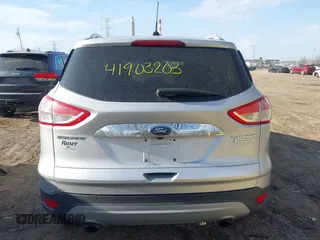 2015 Ford Escape Titanium z VIN 1FMCU0J91FUC41531, wystawiony jako IAAI lot #41903203 z przebiegiem 118 962 mil mil oraz . Historia ofert i sprzedaży dostępna na DreamBid. Obrazek 16.