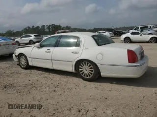 2003 Lincoln Town Car Executive z VIN 1LNHM81W73Y652530, wystawiony jako Copart lot #51606225 z przebiegiem 122 019 mil mil oraz Szkoda całkowita • Salvage title. Historia ofert i sprzedaży dostępna na DreamBid. Obrazek 2.