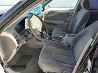2002 Toyota Corolla CE с VIN 1NXBR12EX2Z586078, выставлен на аукционе Copart как лот 61500045 с пробегом Не указан миль и Списание • Salvage title. История ставок и продаж доступна на DreamBid. Изображение 7.