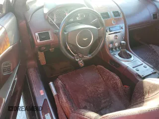 2006 Aston Martin DB9 z VIN SCFAB02A96GB04608, wystawiony jako Copart lot #76550654 z przebiegiem Nie podano mil oraz Nie do naprawy. Historia ofert i sprzedaży dostępna na DreamBid. Obrazek 8.
