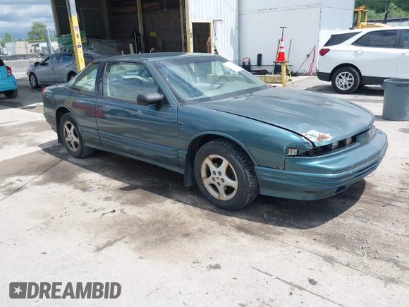 1997 Oldsmobile Cutlass Supreme S z VIN 1G3WH12M9VF317272, wystawiony jako IAAI lot #42346360 z przebiegiem 156 553 mil mil oraz . Historia ofert i sprzedaży dostępna na DreamBid. Obrazek 1.