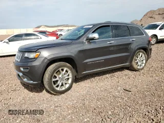 2015 Jeep Grand Cherokee Summit with VIN 1C4RJFJT7FC914429, listed as a Copart auction lot 64400635 with 141,156 mi miles and Salvage title. Bid and sale history available at DreamBid. Image 1.