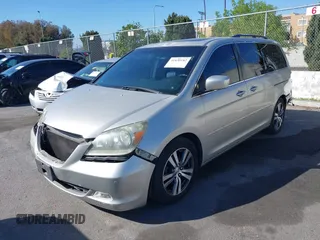 2005 Honda Odyssey TOURING with VIN 5FNRL38865B128519, listed as a IAAI auction lot 41830182 with 171,010 mi miles. Bid and sale history available at carsss.com. Image 2.