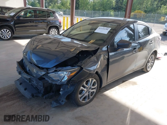 2016 Scion iA z VIN 3MYDLBZV4GY103085, wystawiony jako IAAI lot #42224286 z przebiegiem 90 786 mil mil oraz . Historia ofert i sprzedaży dostępna na DreamBid. Obrazek 2.