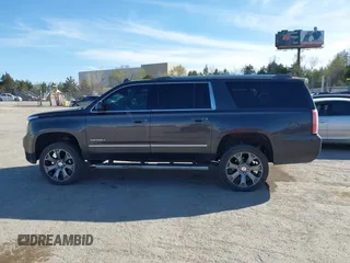 2015 GMC Yukon XL Denali with VIN 1GKS2JKJ9FR634771, listed as a IAAI auction lot 41676218 with 73,271 mi miles. Bid and sale history available at carsss.com. Image 14.