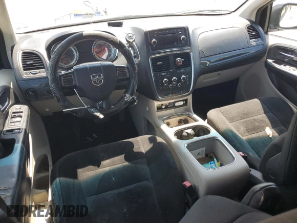 2014 Dodge Grand Caravan SXT z VIN 2C4RDGCG8ER428893, wystawiony jako Copart lot #56671355 z przebiegiem 261 815 mil mil oraz Szkoda całkowita • Salvage title. Historia ofert i sprzedaży dostępna na DreamBid. Obrazek 8.