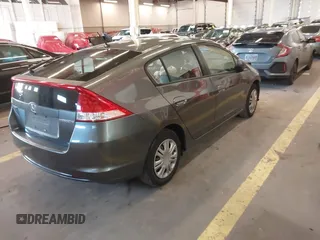 2010 Honda Insight LX with VIN JHMZE2H54AS040316, listed as a IAAI auction lot 41572246 with 142,850 mi miles and . Bid and sale history available at DreamBid. Image 4.