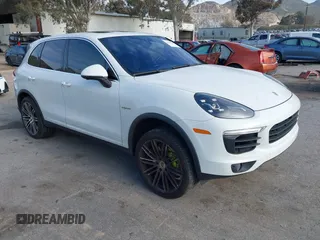 2016 Porsche Cayenne S E-Hybrid with VIN WP1AE2A25GLA58503, listed as a IAAI auction lot 41815568 with 140,635 mi miles and . Bid and sale history available at DreamBid. Image 1.