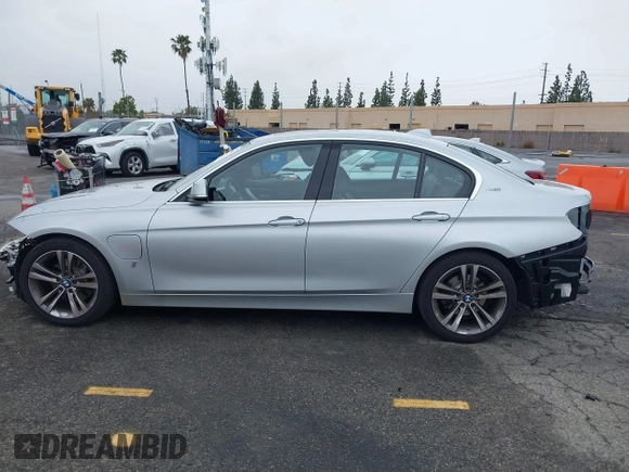 2017 BMW 3 Series 330e iPerformance with VIN WBA8E1C59HK480327, listed as a IAAI auction lot 41809395 with 74,919 mi miles. Bid and sale history available at carsss.com. Image 15.
