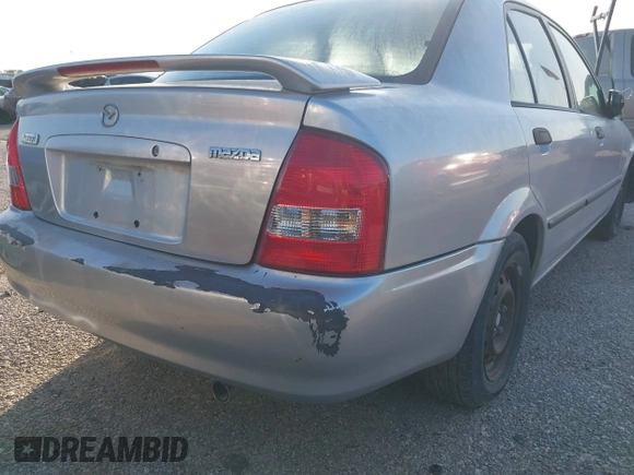 2001 Mazda Protege DX with VIN JM1BJ222810410482, listed as a IAAI auction lot 40799727 with 159,446 mi miles and . Bid and sale history available at DreamBid. Image 15.