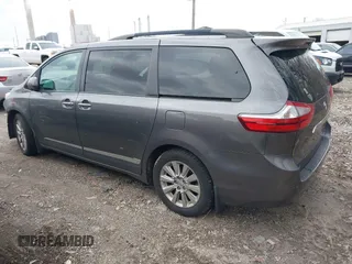 2015 Toyota Sienna Ltd with VIN 5TDDK3DCXFS100341, listed as a IAAI auction lot 41245558 with 114,854 mi miles. Bid and sale history available at carsss.com. Image 3.