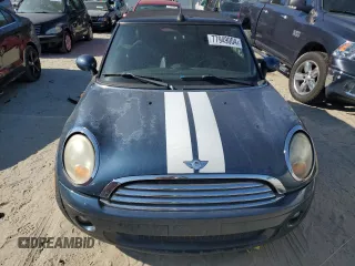 2009 MINI Convertible with VIN WMWMR33559TU96728, listed as a Copart auction lot 77949004 with 86,084 mi miles and Clean title. Bid and sale history available at DreamBid. Image 5.