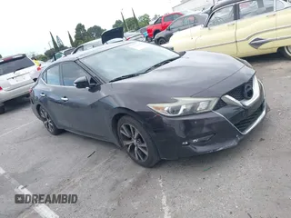 2016 Nissan Maxima SV z VIN 1N4AA6AP9GC388991, wystawiony jako IAAI lot #42110609 z przebiegiem 139 467 mil mil oraz . Historia ofert i sprzedaży dostępna na DreamBid. Obrazek 1.