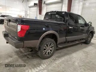 2016 Nissan Titan XD Platinum Reserve with VIN 1N6BA1F49GN517376, listed as a Copart auction lot 81189484 with 147,435 mi miles and Salvage Title. Bid and sale history available at carsss.com. Image 3.
