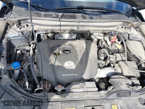 2021 Mazda CX-5 Grand Touring with VIN JM3KFBDM6M1312573, listed as a IAAI auction lot 41936739 with Not Provided miles and . Bid and sale history available at DreamBid. Image 10.