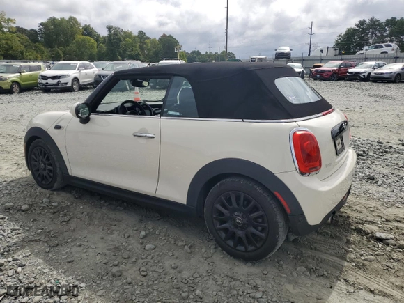 2016 MINI Cooper Convertible with VIN WMWWG5C56G3C18883, listed as a Copart auction lot 70001434 with 57,985 mi miles and Salvage Title. Bid and sale history available at carsss.com. Image 2.