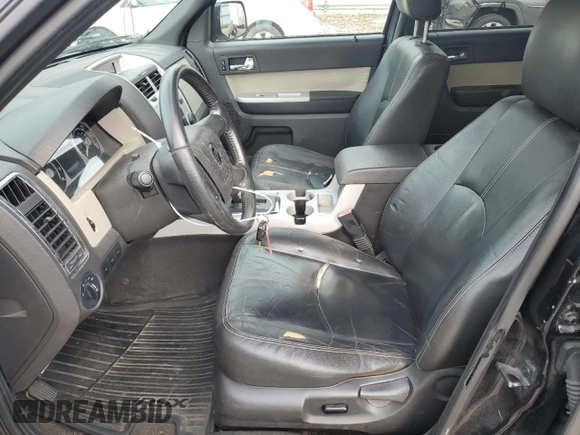 2009 Mercury Mariner Premier z VIN 4M2CU87719KJ20338, wystawiony jako Copart lot #42972595 z przebiegiem 148 871 mil mil oraz Szkoda całkowita • Salvage title. Historia ofert i sprzedaży dostępna na DreamBid. Obrazek 7.