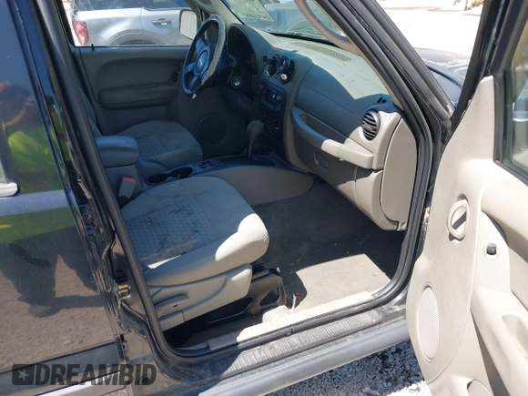 2007 Jeep Liberty Sport with VIN 1J4GL48K37W520729, listed as a IAAI auction lot 42072490 with 115,095 mi miles. Bid and sale history available at carsss.com. Image 5.
