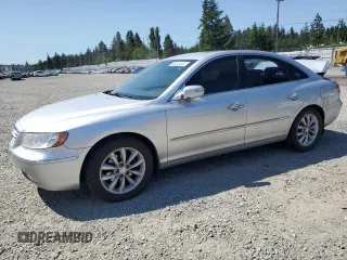 2007 Hyundai Azera SE z VIN KMHFC46F77A241607, wystawiony jako Copart lot #59318345 z przebiegiem 198 664 mil mil oraz Szkoda całkowita • Salvage title. Historia ofert i sprzedaży dostępna na DreamBid. Obrazek 1.
