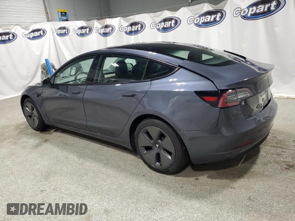 2022 Tesla Model 3 with VIN 5YJ3E1EA8NF287506, listed as a Copart auction lot 55674145 with 106,745 mi miles and Clean Title. Bid and sale history available at DreamBid. Image 2.