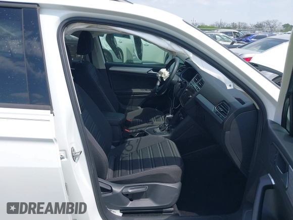 2024 Volkswagen Tiguan S with VIN 3VVRB7AXXRM105923, listed as a IAAI auction lot 42052697 with 18,421 mi miles and . Bid and sale history available at DreamBid. Image 5.