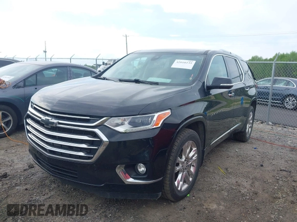 2020 Chevrolet Traverse High Country with VIN 1GNERNKW3LJ186049, listed as a IAAI auction lot 42010235 with 125,847 mi miles and . Bid and sale history available at DreamBid. Image 2.