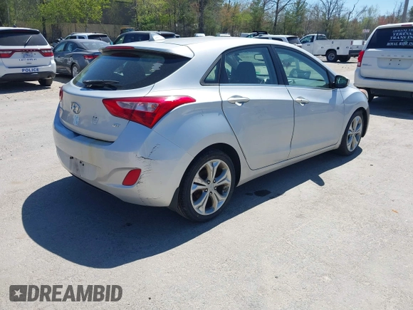 2013 Hyundai Elantra GT with VIN KMHD35LE7DU086883, listed as a IAAI auction lot 42158289 with 117,290 mi miles. Bid and sale history available at carsss.com. Image 4.