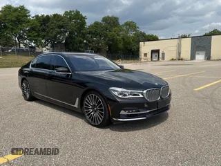 2016 BMW 7 Series 750i xDrive with VIN WBA7F2C57GG417520, listed as a Copart auction lot 67241935 with 94,461 mi miles and Clean title. Bid and sale history available at DreamBid. Image 1.