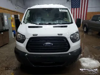 2015 Ford Transit Cargo with VIN 1FTNE1ZM0FKA59369, listed as a Copart auction lot 87335004 with 124,883 mi miles and Clean Title. Bid and sale history available at carsss.com. Image 5.