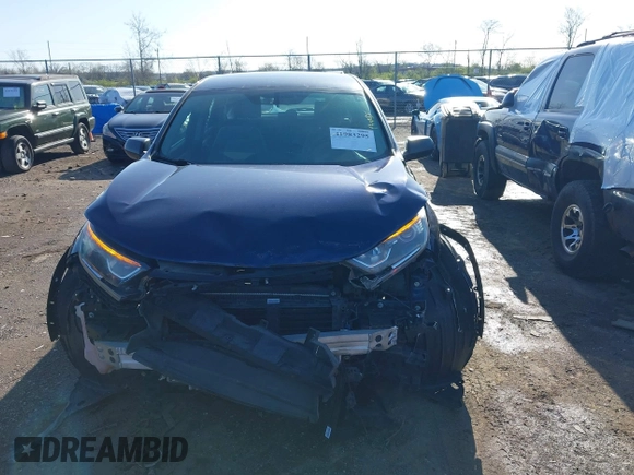 2017 Honda CR-V LX with VIN 2HKRW6H37HH202243, listed as a IAAI auction lot 41983295 with 124,948 mi miles. Bid and sale history available at carsss.com. Image 13.