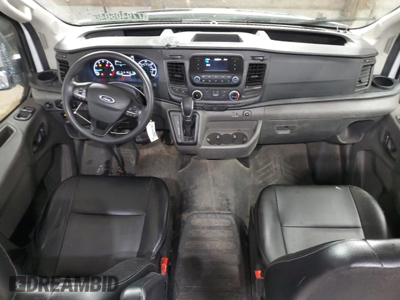 2023 Ford Transit Cargo with VIN 1FTBR3U89PKA70899, listed as a Copart auction lot 77940504 with 62,196 mi miles and Clean Title. Bid and sale history available at DreamBid. Image 8.