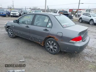 2006 Mitsubishi Lancer ES with VIN JA3AJ26E76U066867, listed as a IAAI auction lot 41904428 with 247,460 mi miles. Bid and sale history available at carsss.com. Image 3.