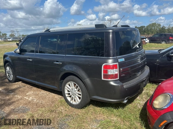 2016 Ford Flex SEL z VIN 2FMGK5C83GBA09724, wystawiony jako Copart lot #80993314 z przebiegiem 188 103 mil mil oraz Czysty tytuł • Clean title. Historia ofert i sprzedaży dostępna na DreamBid. Obrazek 3.