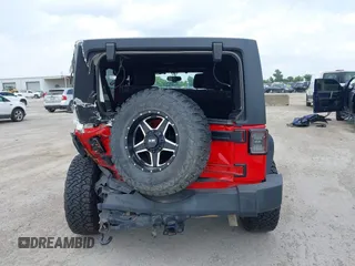 2015 Jeep Wrangler Unlimited Sport with VIN 1C4HJWDGXFL575918, listed as a IAAI auction lot 42349494 with Not provided miles and . Bid and sale history available at DreamBid. Image 16.