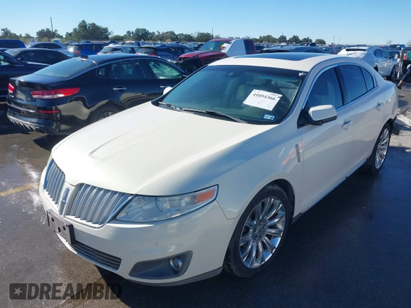 2009 Lincoln MKS z VIN 1LNHM93RX9G618156, wystawiony jako IAAI lot #41054366 z przebiegiem 127 060 mil mil oraz . Historia ofert i sprzedaży dostępna na DreamBid. Obrazek 20.
