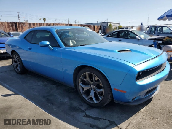 2015 Dodge Challenger SXT Plus with VIN 2C3CDZBG5FH835505, listed as a Copart auction lot 51276635 with 58,437 mi miles and Salvage title. Bid and sale history available at DreamBid. Image 4.