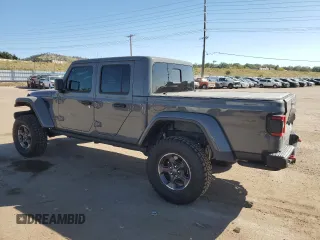 2022 Jeep Gladiator Rubicon z VIN 1C6JJTBG9NL101774, wystawiony jako Copart lot #74597074 z przebiegiem 11 903 mil mil oraz Szkoda całkowita • Salvage title. Historia ofert i sprzedaży dostępna na DreamBid. Obrazek 2.