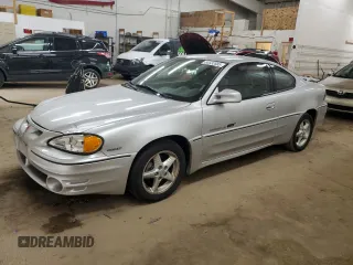 2001 Pontiac Grand Am GT z VIN 1G2NW12E81M525597, wystawiony jako Copart lot #55532685 z przebiegiem 144 167 mil mil oraz Szkoda całkowita • Salvage title. Historia ofert i sprzedaży dostępna na DreamBid. Obrazek 1.