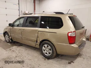 2009 Kia Sedona LX with VIN KNDMB233996314804, listed as a IAAI auction lot 42014187 with 220,693 mi miles and . Bid and sale history available at DreamBid. Image 3.