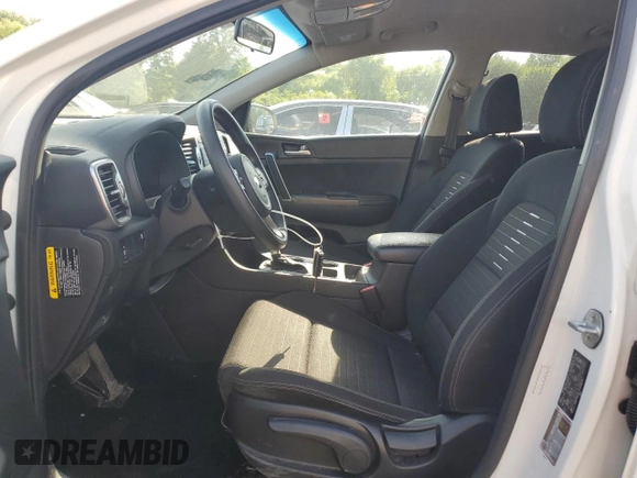 2018 Kia Sportage LX z VIN KNDPMCAC7J7448175, wystawiony jako Copart lot #59800765 z przebiegiem 138 825 mil mil oraz Czysty tytuł • Clean title. Historia ofert i sprzedaży dostępna na DreamBid. Obrazek 7.