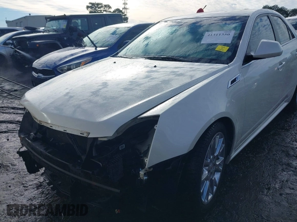2012 Cadillac CTS Premium with VIN 1G6DP5E3XC0144157, listed as a IAAI auction lot 41311350 with 96,042 mi miles and . Bid and sale history available at DreamBid. Image 6.
