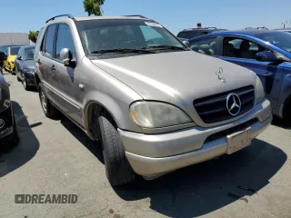 2001 Mercedes-Benz M-Class with VIN 4JGAB54EX1A259944, listed as a Copart auction lot 62058904 with 178,674 mi miles and Clean Title. Bid and sale history available at carsss.com. Image 4.